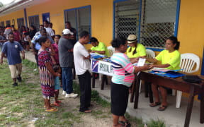 Voters line up to get their ballots during the 2015 election in Majuro
