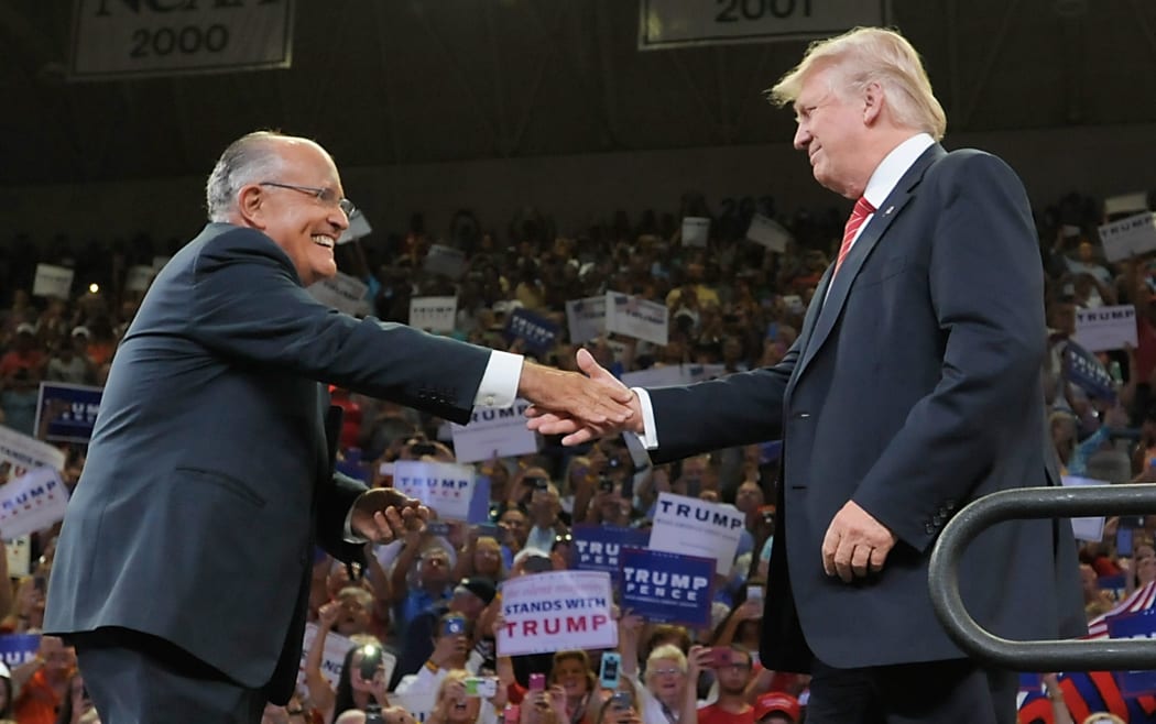 Former New York mayor Rudy Giuliani has been chaperoning Donald Trump this week.