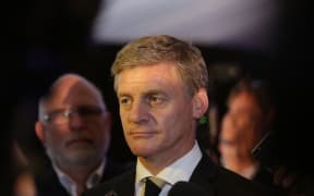 Bill English speaks at a press conference after meeting with Chinese Premier Li Keqiang.
