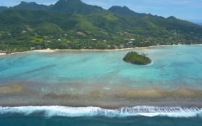 Aerial landscape view of the beautiful Muri Lagoon and a Motu (Islet) in Rarotonga Island in the Cook Islands.