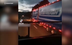 The dangerous overtake by a Mainfreight truck on SH2.