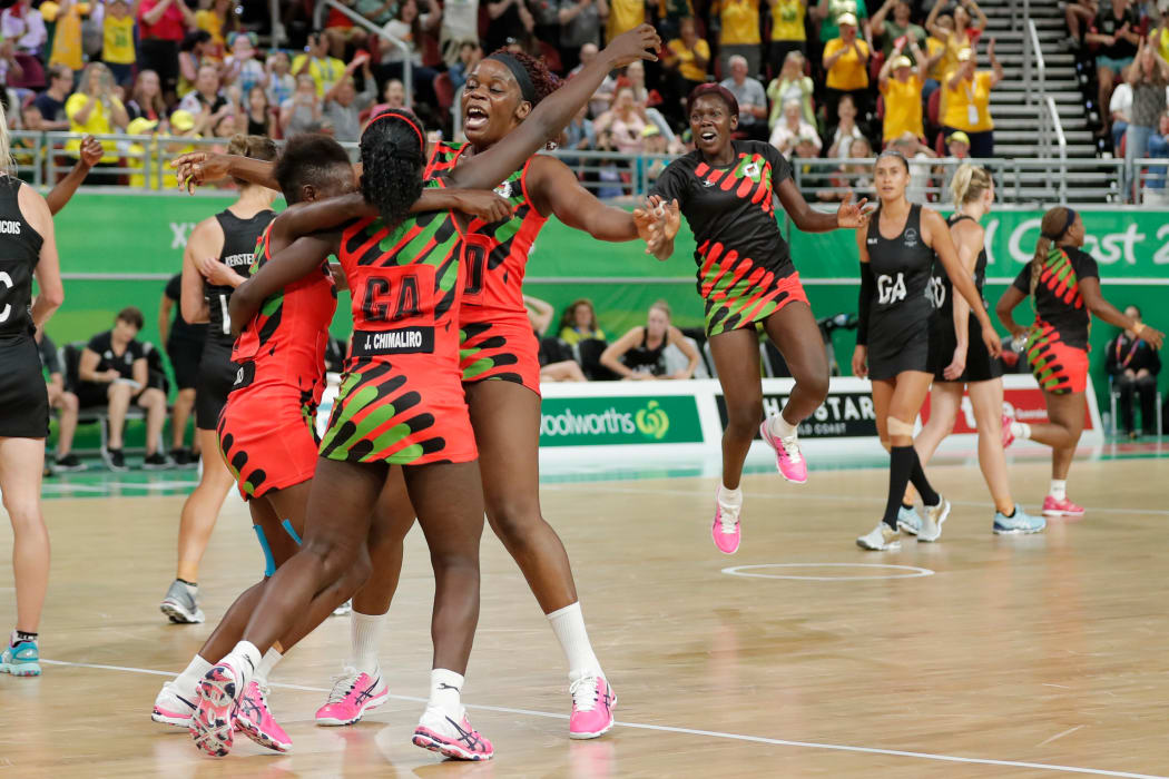 Malawi players celebrate after defeating New Zealand.