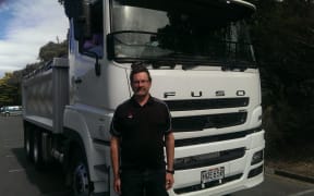 Mitsubishi Fuso's Mike Davidson in front of a HD Euro.