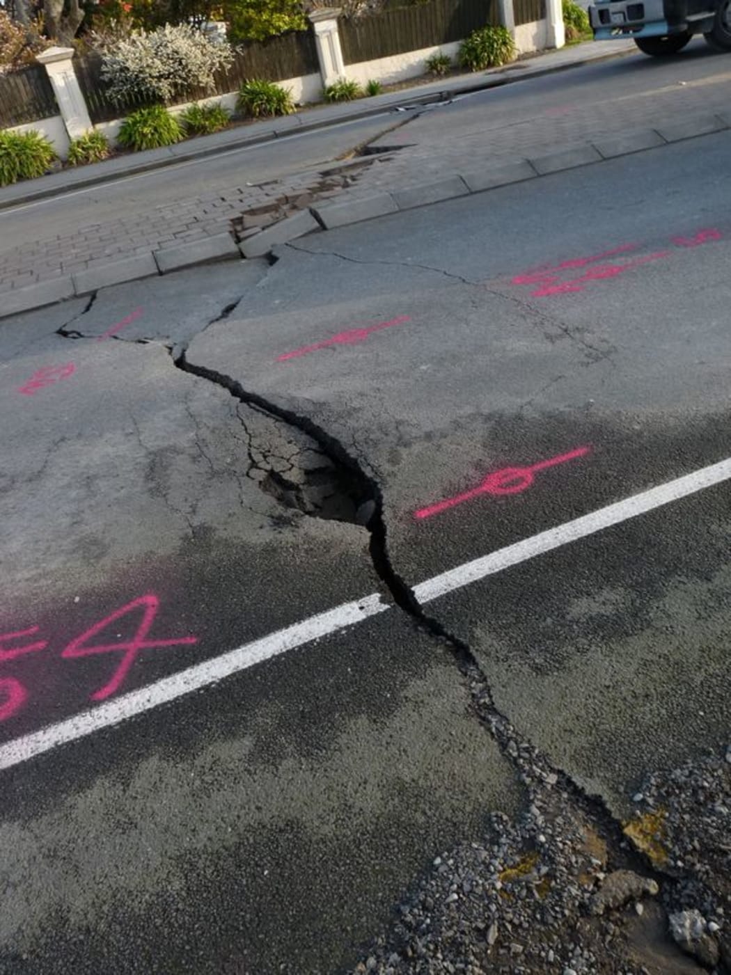A crack in Woodham Road caused by the Christchurch Earthquake