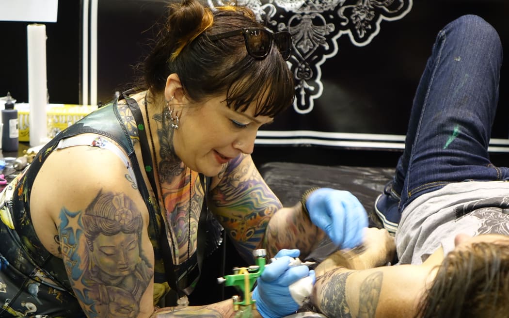 Dunedin tattoo artist Aja Ann at work during the New Zealand Tattoo and Art Festival in New Plymouth at the weekend.