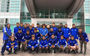 Solomon Islands pose outside the National Stadium in Taipei before their victory.