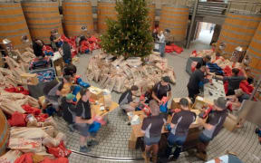 The Craggy Range winery team assemble the toys.
