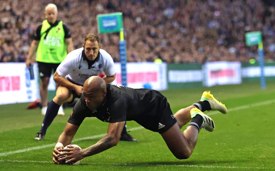 Mark Telea scores the All Black's fourth try of the game during the Autumn International match between Scotland and New Zealand at Murrayfield Stadium on November 13, 2022 in Edinburgh, Scotland.