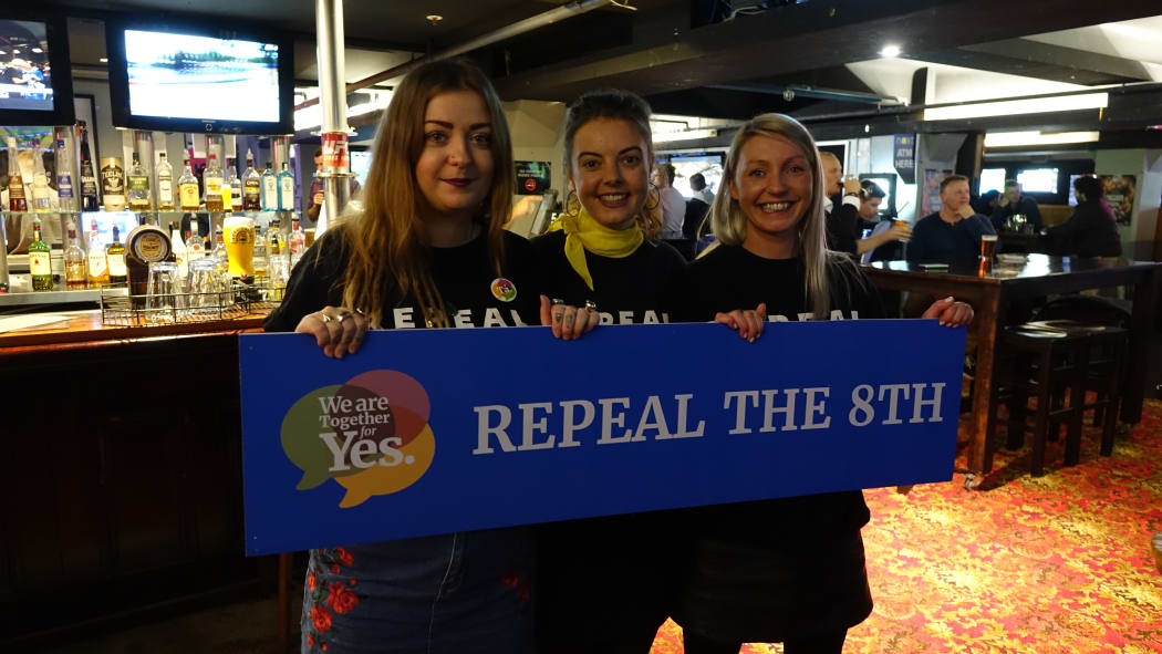 Heather Byrne (left), Eimear Connolly (middle) and another Irish yes supporter in Wellington on Saturday night.