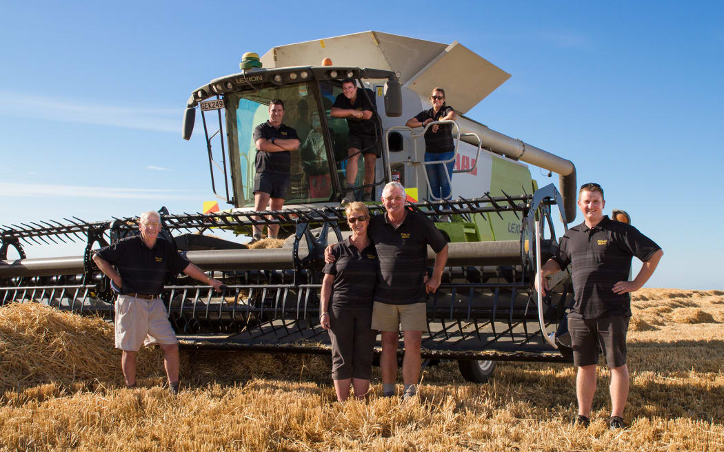 Warren and Joy Darling - and family - with their record-breaking barley crop.