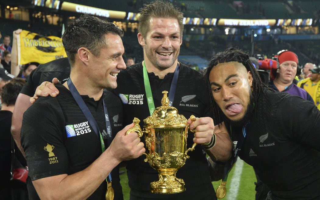 Dan Carter, Richie McCaw and Ma'a Nonu with the William Webb Ellis Cup.