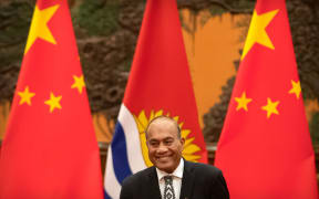 Kiribatis President Taneti Maamau reacts during a signing ceremony at the Great Hall of the People in Beijing on January 6, 2020.