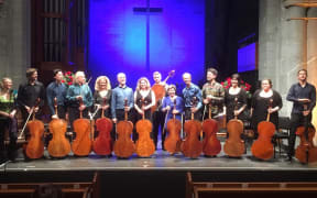 The cellists of the 2017 Adam Chamber Music Festival with soprano Jenny Wollerman (left)