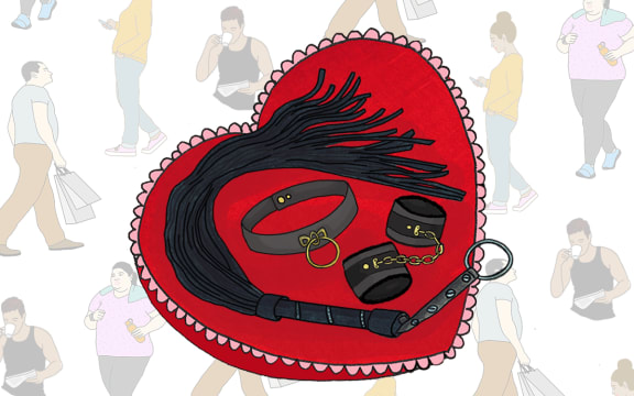 A whip, handcuffs and choker sit on a heart-shaped pillow. In the background, people go about their everyday lives - representing how you can't tell what someone's into just by looking at them.