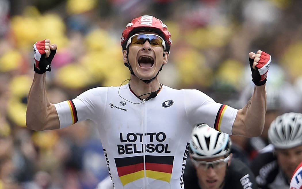 Andre Greipel wins a stage in the 2014 Tour de France. Greipel dedicated the victory to team mate Greg Henderson.