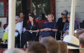 Prime Minister Jacinda Ardern and National Party leader Judith Collins listening to speakers at Te Whare Rūnanga on 4 February, 2021.