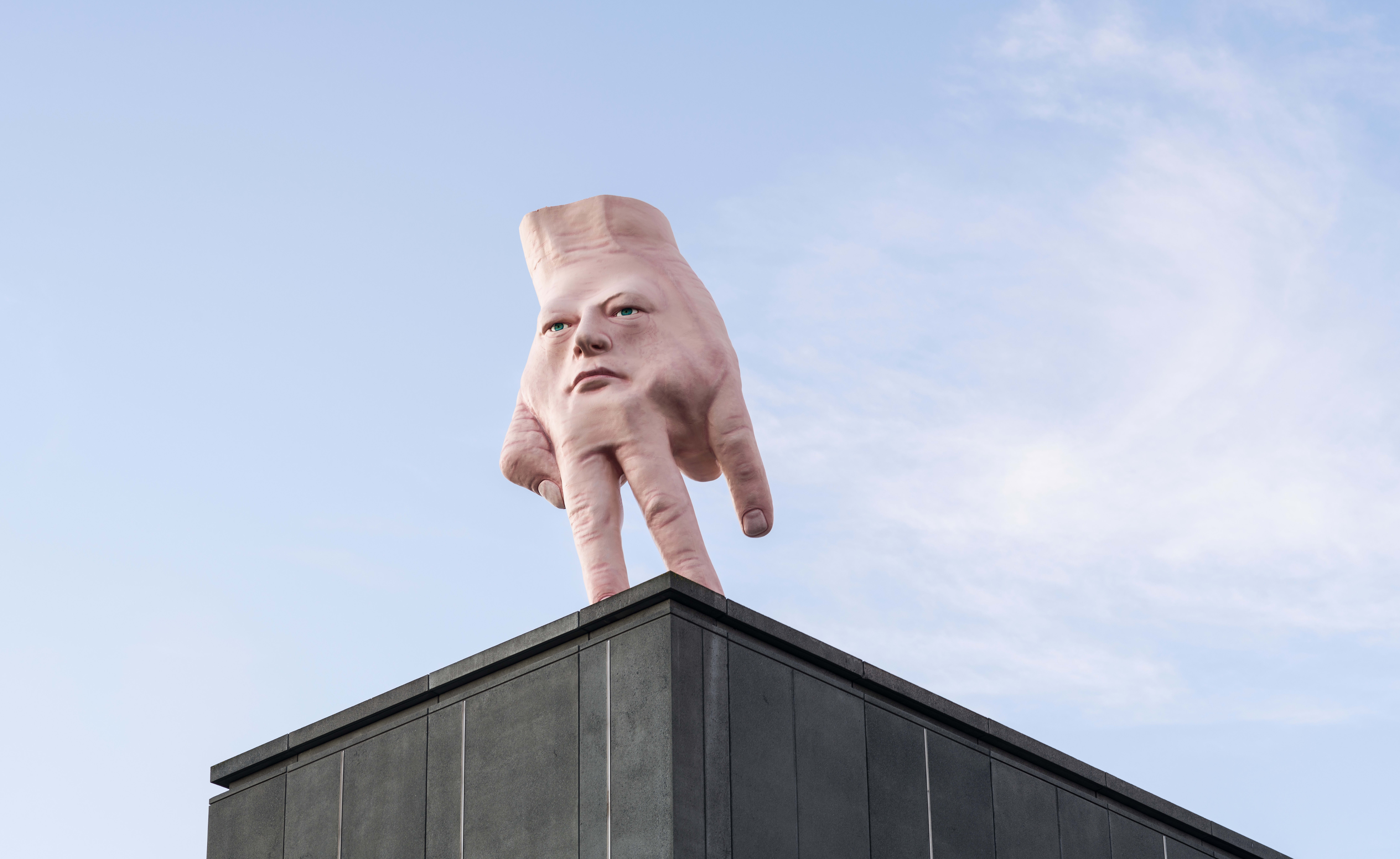 Ronnie van Hout's sculpture Quasi is five-metres tall, made of steel, polystyrene and painted resin.