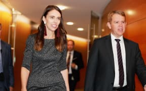 Jacinda Ardern and Chris Hipkins on their way to announce the trans-Tasman travel bubble start date.