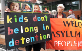 Protestors in Sydney ask the government not to send asylum-seekers back to Nauru