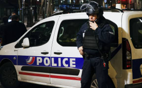 French police officer in Paris, May 2017, during a security alert.