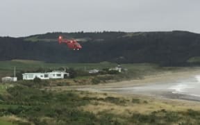 A Westpac rescue helicopter comes in to land at Curio Bay