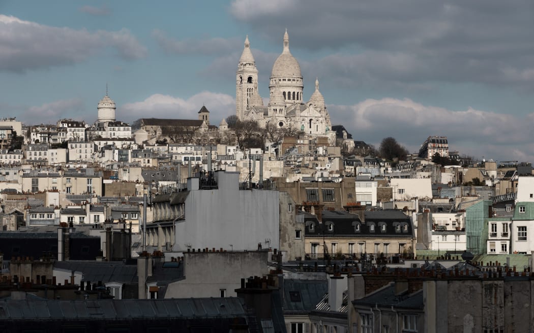 Sacre-Coeur Basilica at the summit of the butte of Montmartre in Paris.