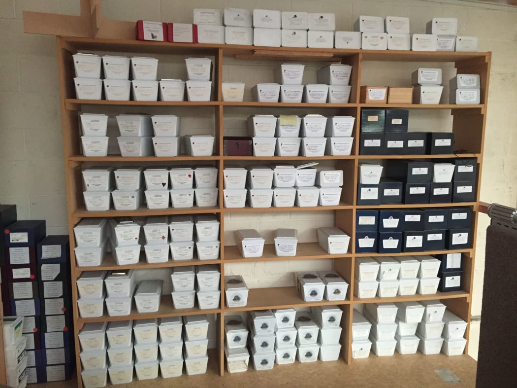 The wall of unclaimed ashes at J Weir & Co Funeral Directors in Onehunga.