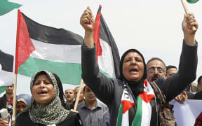 Palestinians demonstrate in the Gaza Strip in support of the new attempt at reconciliation