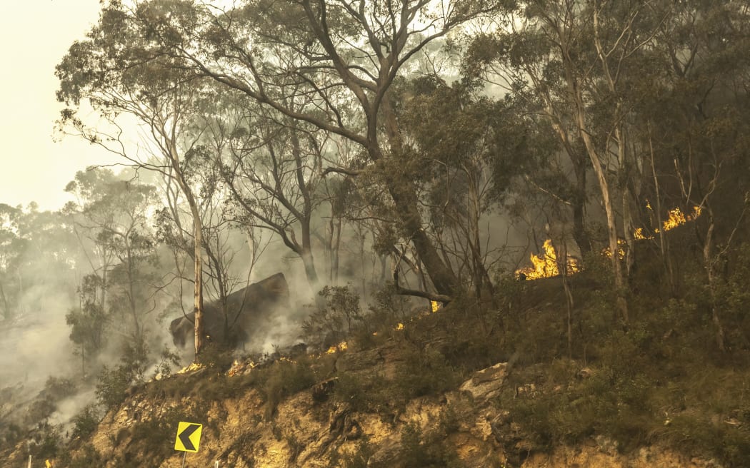 Australian firefighters say they will ground water-bombing helicopters if a drone aircraft flies near the fires they're fighting