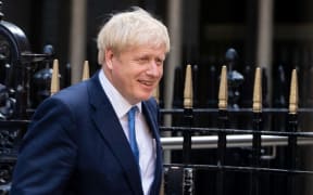 New Conservative Party leader and incoming prime minister Boris Johnson leaves the Conservative party headquarters in central London.