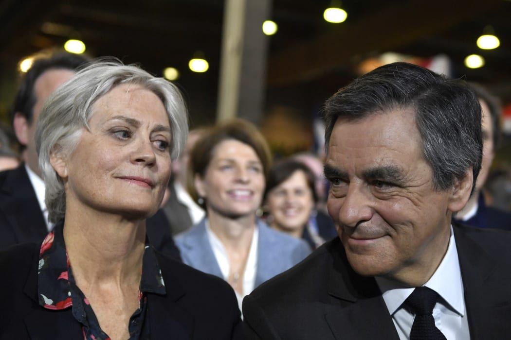 Francois Fillon,  right, and wife Penelope during a campaign rally in January.