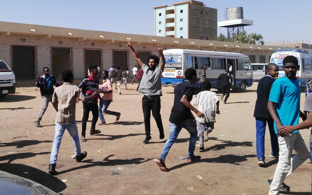 Anti-government demonstrators in the Sudanese capital Khartoum. Sudanese police fired tear gas today at crowds of anti-government protesters in Khartoum after organisers called for nationwide rallies against President Omar al-Bashir.