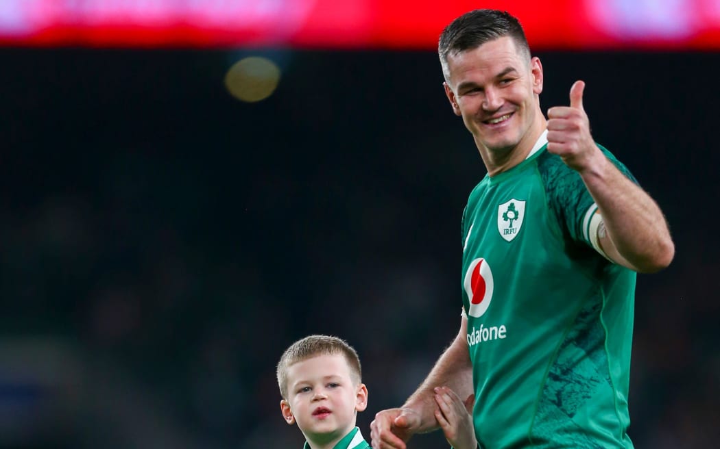 Ireland's Johnny Sexton celebrates with his son Luca.
