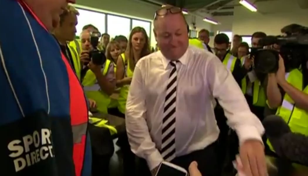 Mike Ashley's photo opportunity goes horribly wrong.