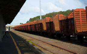 Rustry disused log train cars lined up at the Whangarei rail yards