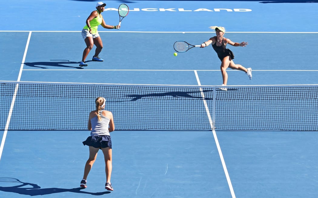 Taylor Townsend (left) and Paige Hourigan (right) during a match against Eugenie Bouchard and Sofia Kenin.