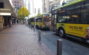 Largely empty buses on Wellington's Lambton Quay on the first day of level 3, 28 April