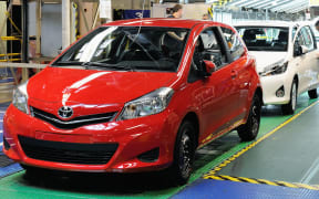 Toyota Yaris cars on the assembly line.