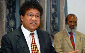 Papua New Guinea's Attorney General Ano Pala and the man he replaced in the job, Kerenga Kua.