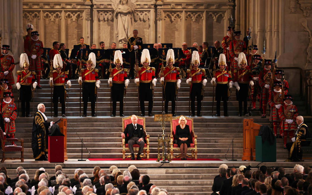 Britain's King Charles III and Britain's Camilla, Queen Consort attend the presentation of Addresses by both Houses of Parliament in Westminster Hall, inside the Palace of Westminster, central London on September 12, 2022, following the death of Queen Elizabeth II on September 8.