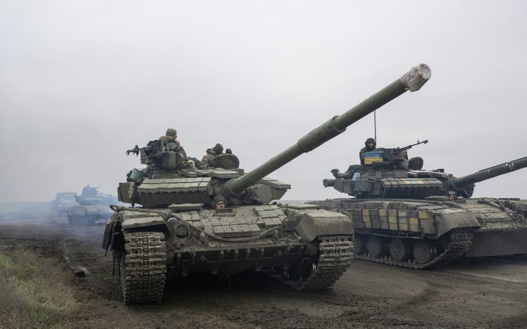 Ukrainian army tank units drive towards Kherson's frontline on the way to Kherson on 18 November, 2022.