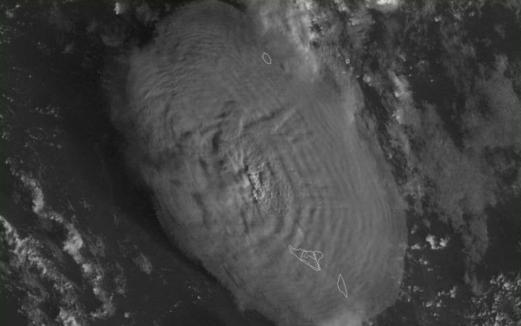 A screen grab taken from the NOAA GOES-West satellite on 15 January 2022 shows the volcanic eruption that provoked a tsunami in Tonga.