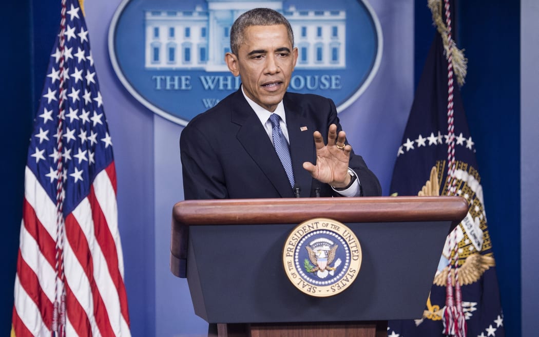 Barack Obama speaking with reporters at the White House on 19 December (local time).