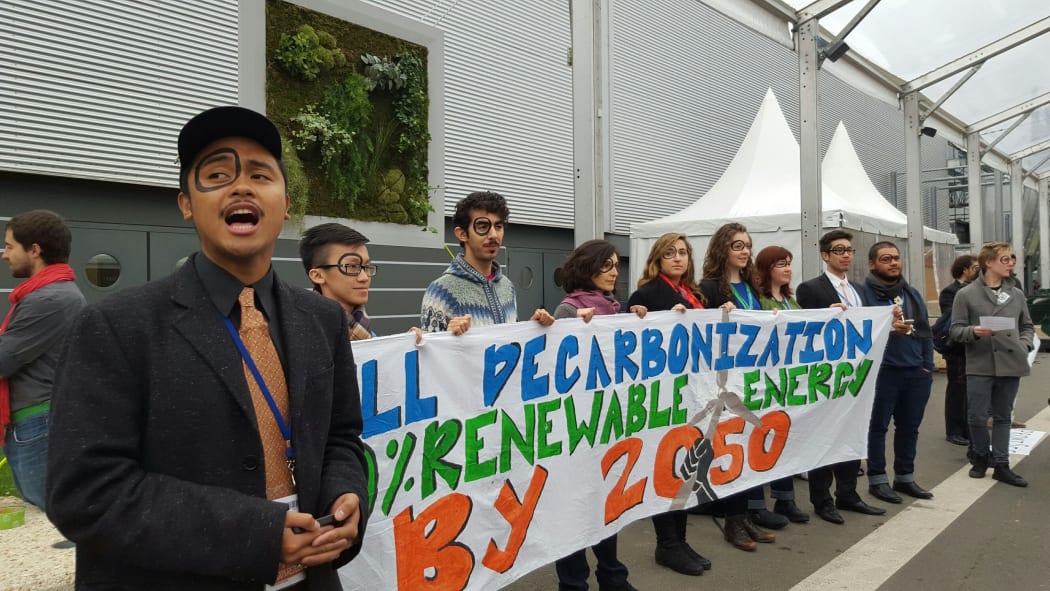 Members of an international youth delegation - including New Zealanders - at the UN Climate Change meeting in Paris.