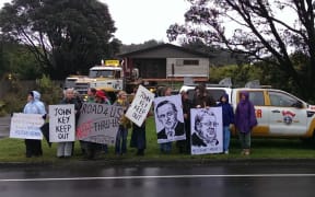Kapiti residents protesting against the demolition of houses for a planned expressway.