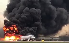 A screengrab of a social media video shows a fire of a Russian-made Superjet-100 at Sheremetyevo airport outside Moscow.