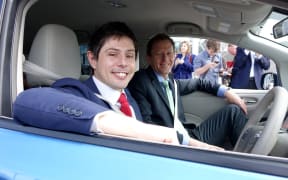 Green MP Gareth Hughes (left) and co-leader Russel Norman in a Nissan Leaf electric car at a campaign announcement on energy.