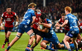 Codie Taylor of the Crusaders is tackled by Ofa Tuï¿½ungafasi  and Josh Goodhue of the Blues during the Super Rugby Aotearoa, Crusaders V Blues, at Orangetheory Stadium, Christchurch, New Zealand, 11th July 2020.