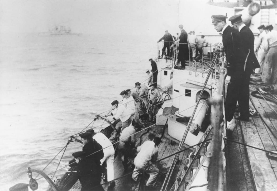 German naval officer Martin Niemöller (top, foreground) commands a U-Boat during World War I.