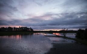 Sunset over a flooded Waimate
